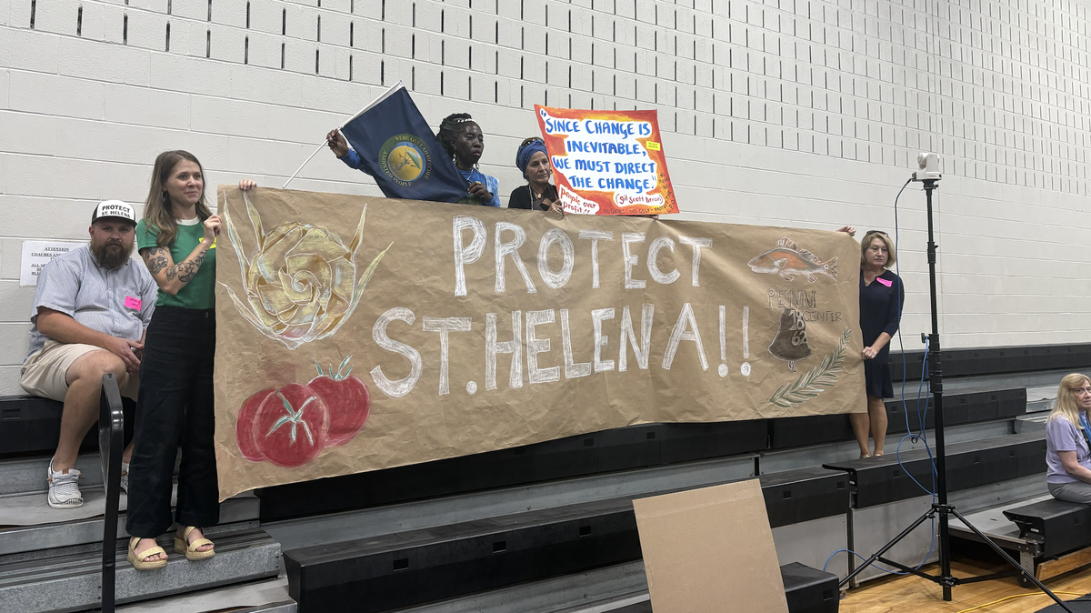 Community members gathered in the Burton Wells Recreation Center Monday well before the 6 p.m. start time to fill seats for the council’s public hearing and vote on a proposed agreement and zoning map amendment for development on Pine Island.