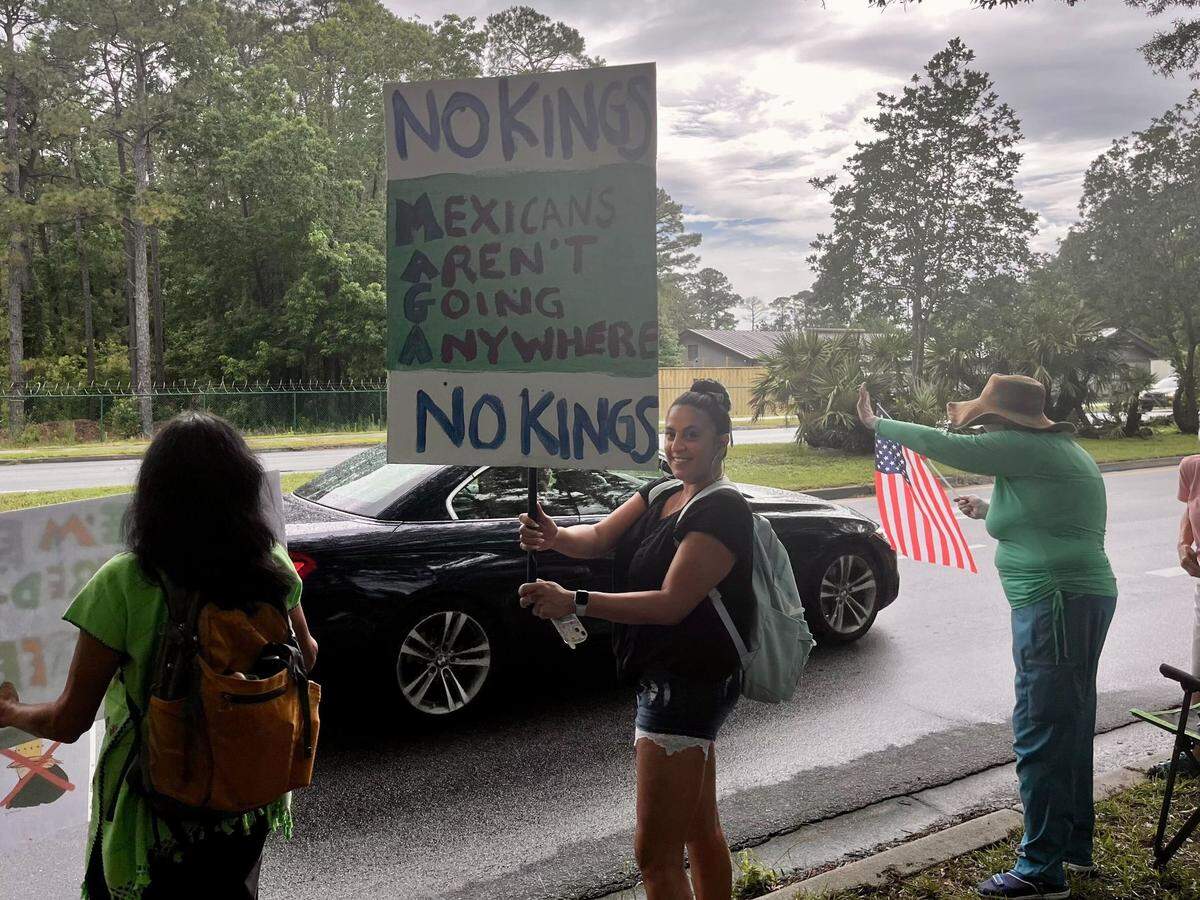 Maya Agosto with her sign on June 14, 2025