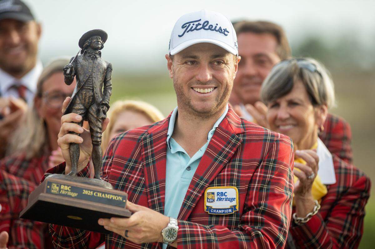 Justin Thomas with his championship trophy following the final round of the RBC Heritage at Harbour Town Golf Links on Sunday, April 20, 2025, in Sea Pines on Hilton Head Island.