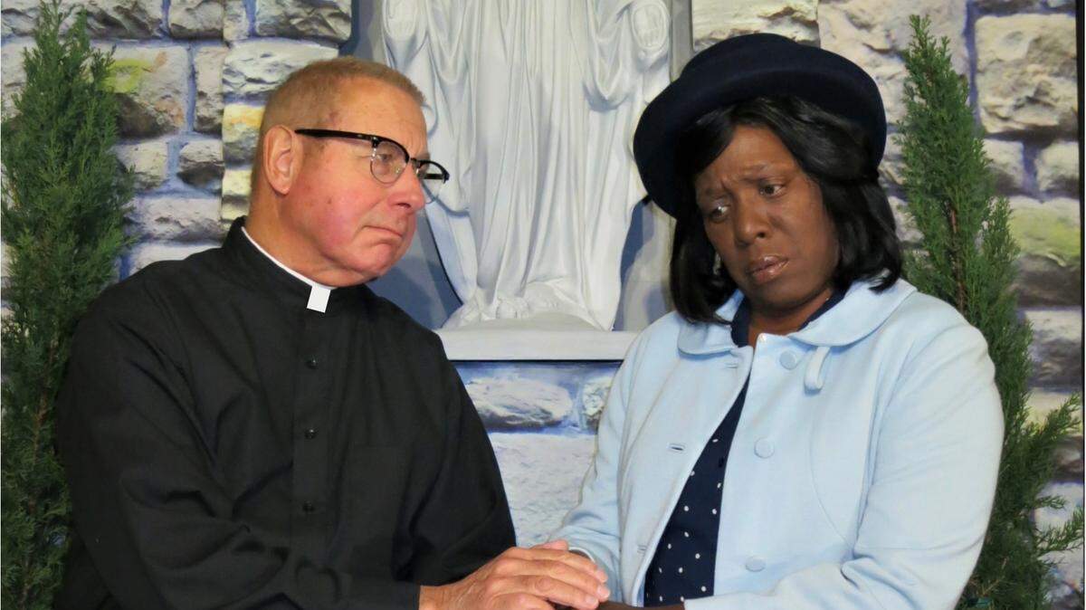 Father Flynn (Brooke Pearson) and Mrs. Muller (Paulette Edwards) in “Doubt: A Parable” presented by Coastal Stage Productions.