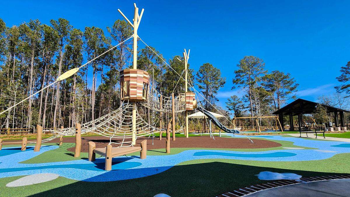 A climbing structure with a rope bridge leads to a slide as photographed on Jan. 28, 2025, is featured in one section at the New Riverside Barn Park set for a grand opening on Feb. 22 in Bluffton.