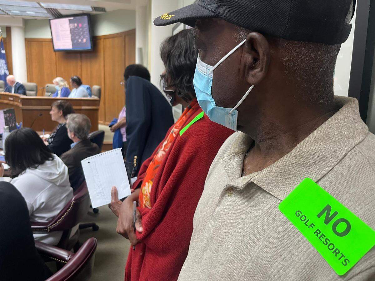 It was standing-room only at a meeting of the Beaufort County Planning Commission Thursday when a proposed golf course and housing development and changes to zoning on Helena Island were discussed. Many residents wore stickers that said, “No Golf Courses and “Protect St. Helena.”