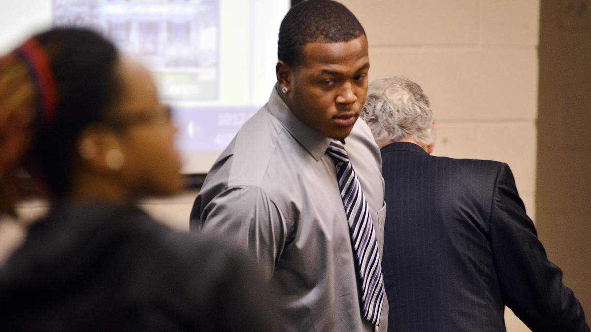 Shameik Blackshear, center, with his lawyer Thomas C. Taylor stand at Blackshear's hearing April 21, 2015, at the Bluffton's Theodore D. Washington Municipal Building. To watch a video, go to:?http://bit.ly/1gf1c6W