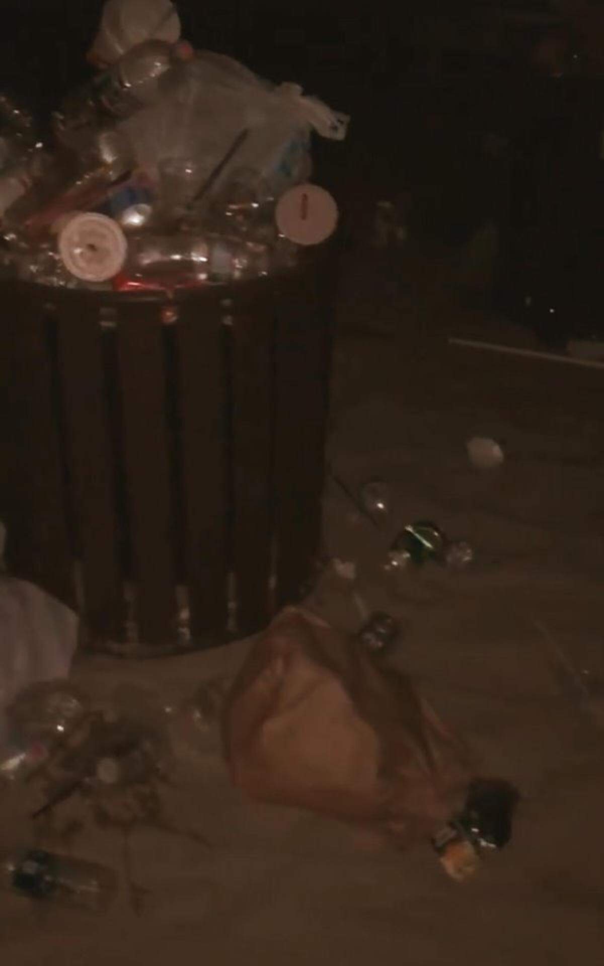 A picture of an overfilled beach trash can on Coligny Beach on Memorial Day weekend.
