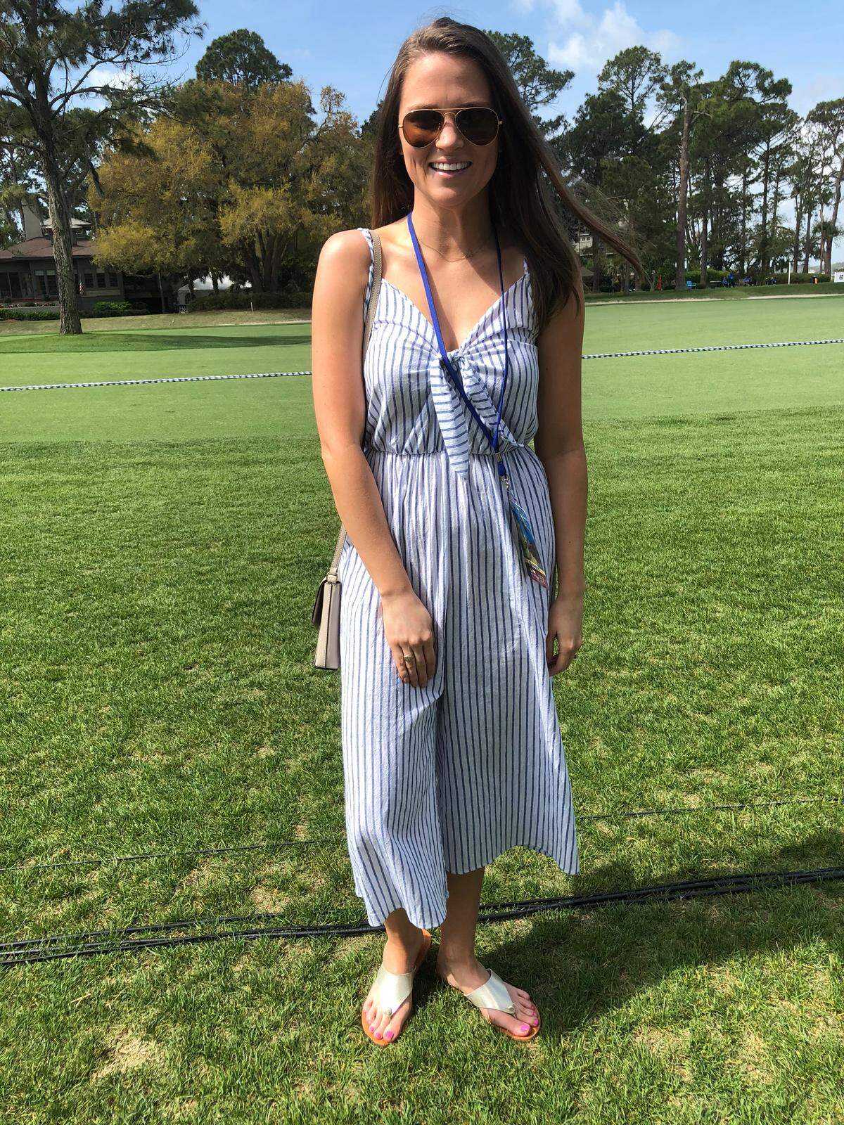 Kristein Whittaker, who traveled to Hilton Head from Charlotte, wears a jumpsuit at the RBC Heritage Golf Tournament on Friday, April 13, 2018.