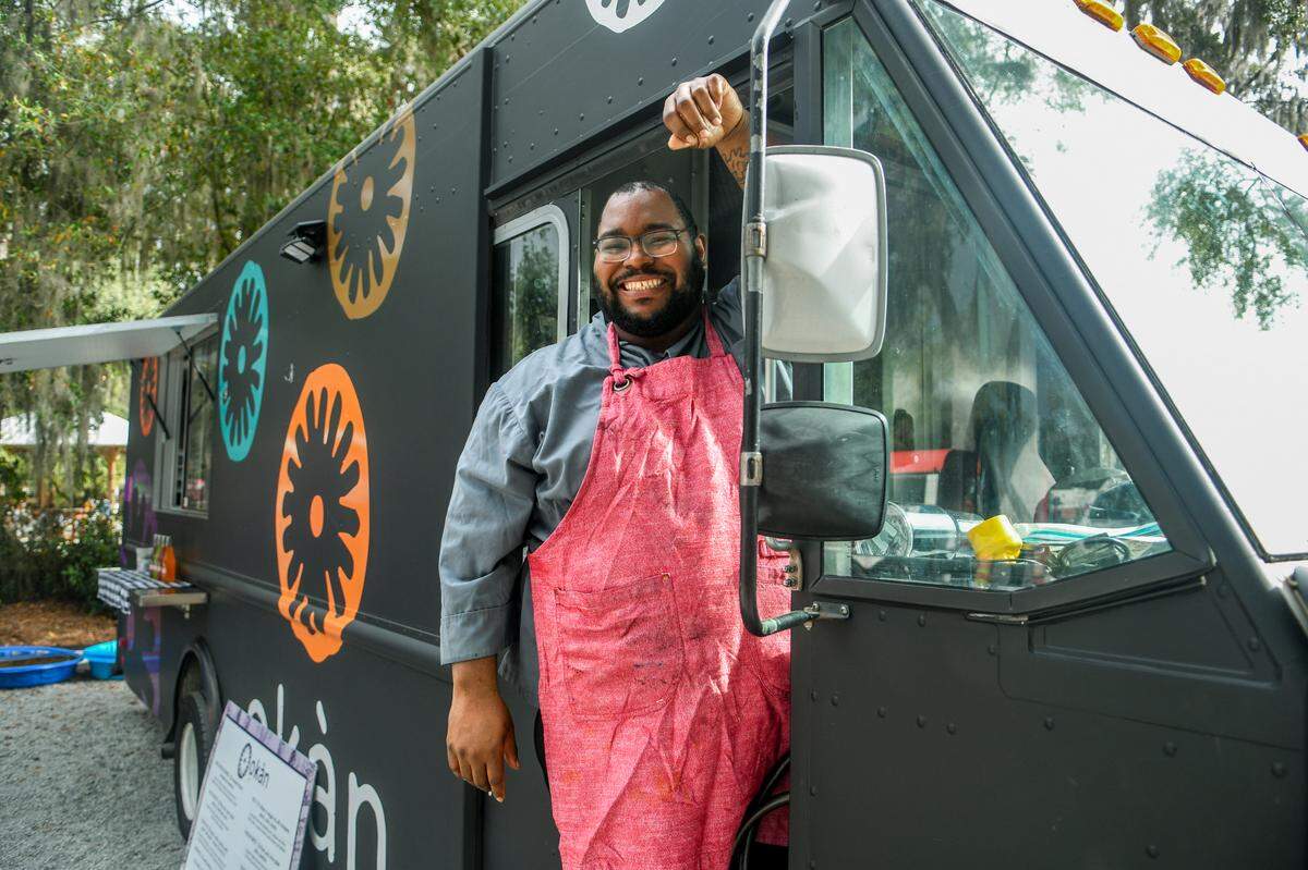 Executive Chef Bernard Bennett, one of 20 semifinalists in the Emerging Chef category by the James Beard Foundation, stands for a portrait with the Okan food truck on Thursday, Feb. 2, 2023, at the Bluffton Farmers Market.