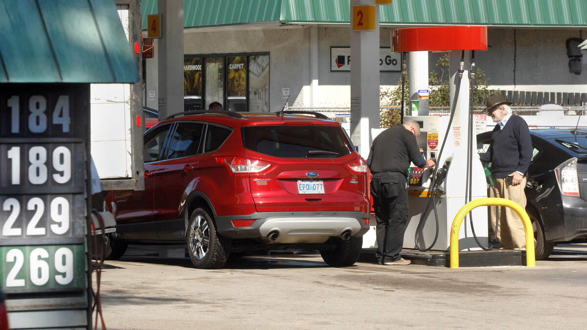 File photo: Customers gas up at the Mathews Drive Enmark station on Hilton Head earlier this year.
