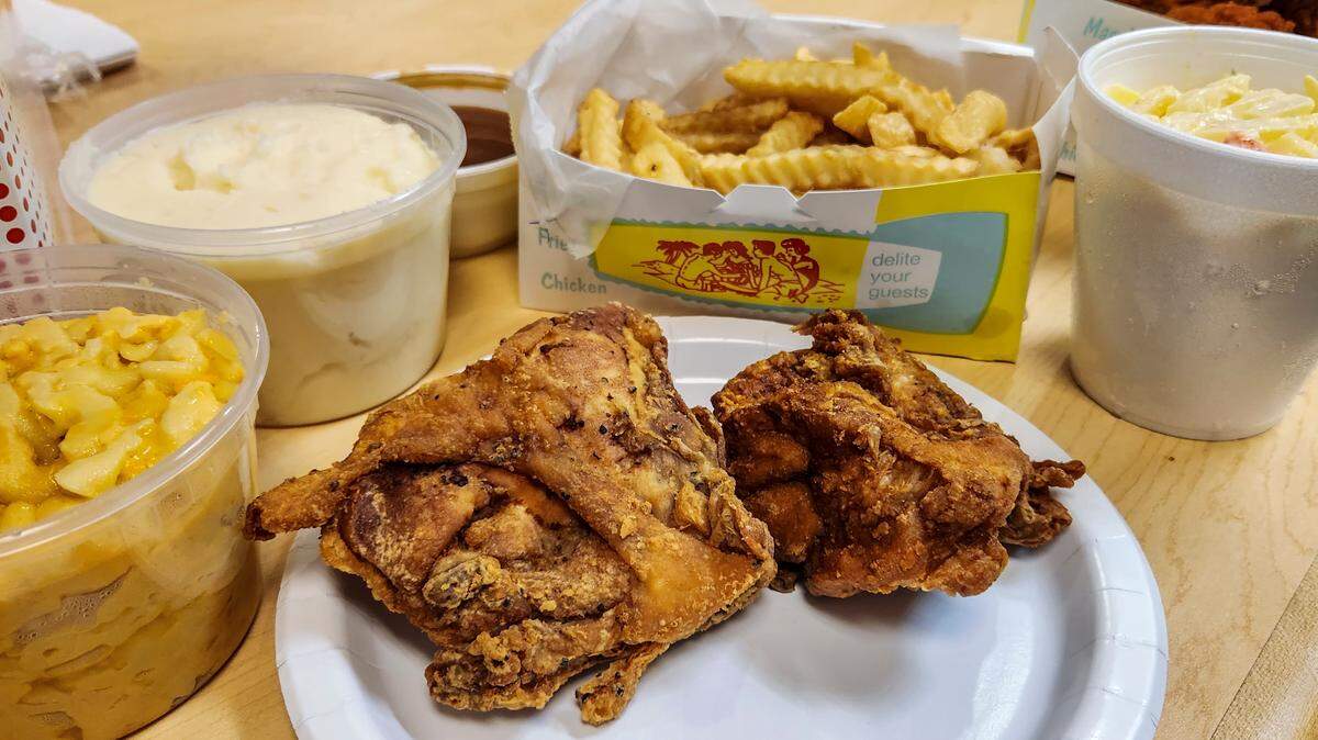 Fried chicken meals plated with chicken breasts from the two finalists in Beaufort County’s best fried chicken. Cahill’s Chicken Kitchen in Bluffton with macaroni and cheese and mashed potatoes with gravy, left, and Maryland Fried Chicken in Beaufort with fries and potato salad.