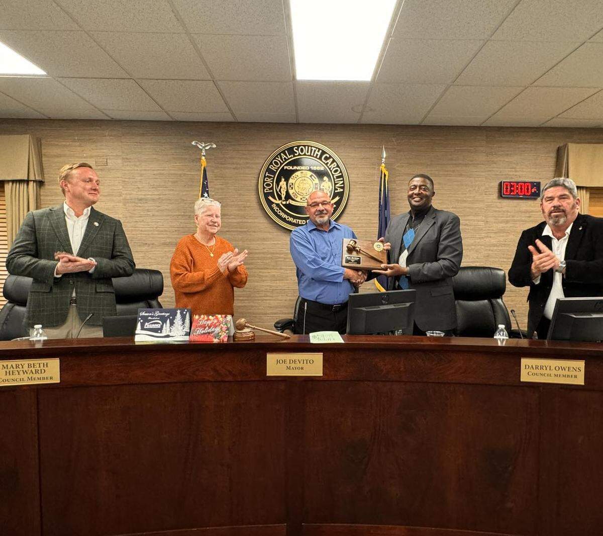 Mayor Joe DeVito, center, was recognized for his service during his final meeting Wednesday.