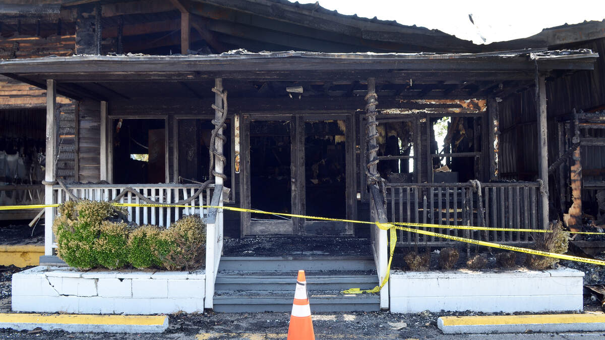 Photographed July 20, 2015, the blackened burnt-out shell is all that remains of the Port Royal seafood market. Investigators have ruled out arson as the cause of the July 19 fire that ripped through the building and forced one of the area's most popular restaurants, 11th Street Dockside, to close indefinitely. The fire started in the market and grew between the first and second floors in the market's back corner, Beaufort-Port Royal Fire Department Capt. John Robinson said. 