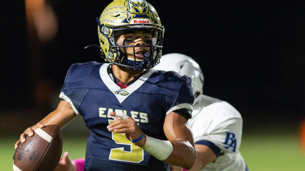 Hilton Head Christian Academy’s Jace Blackshear scrambles away from a Beaufort Academy player on Friday, Oct. 22, 2021.