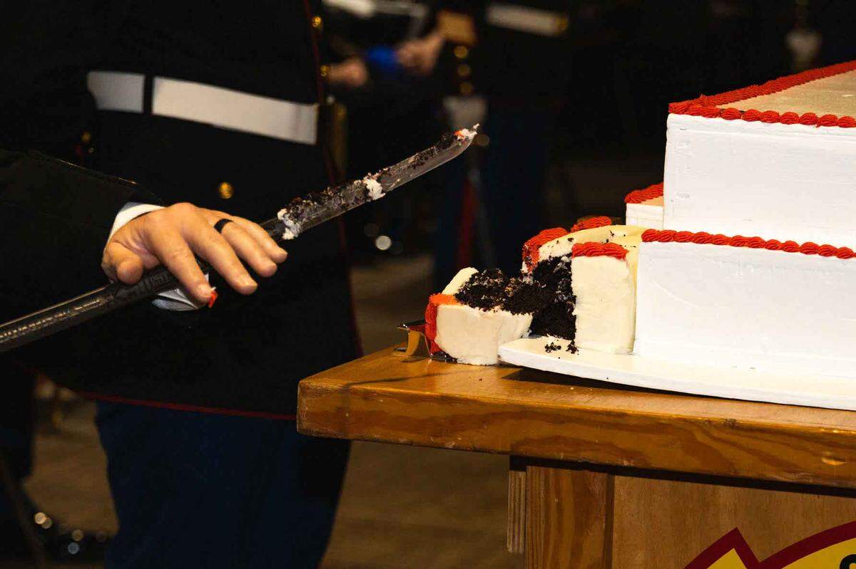 Marines at Air Station Beaufort cut the cake during a ceremony celebrating the 248th birthday of the Marine Corps.