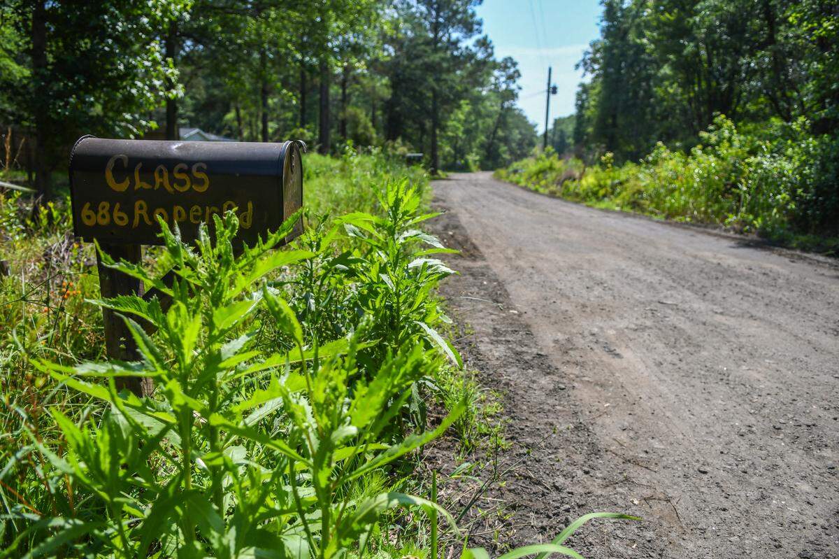 According to documents posted at the S.C. Department of Environmental Services, mining trucks and equipment would use Roper Road, a dirt and gravel road that leads to homes, as photographed on May 20, 2025, in Levy, S.C.