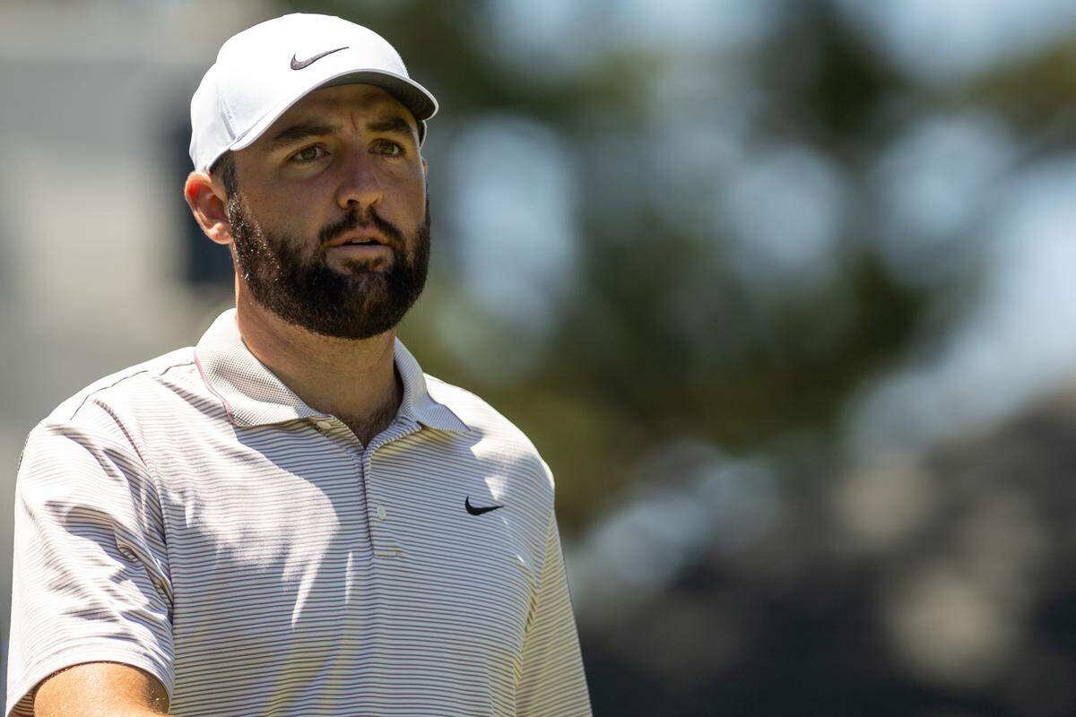 Defending champion Scottie Scheffler walks down the fairway on the 15th hole during the first round of the RBC Heritage Presented by Boeing at Harbour Town Golf Links on Thursday, April 17, 2025, in Sea Pines on Hilton Head Island.
