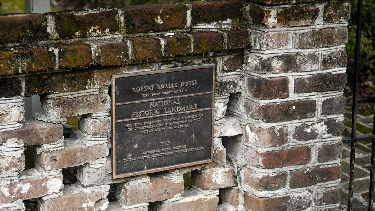 The marker on the front gate designating the Robert Smalls home as a National Historic Landmark with the National Parks Service as photographed on Thursday, Feb. 2, 2023.