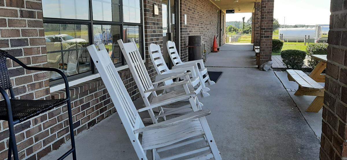 Visitors to Beaufort Executive Airport site can site in rocking chairs on the porch and watch planes land and take off.