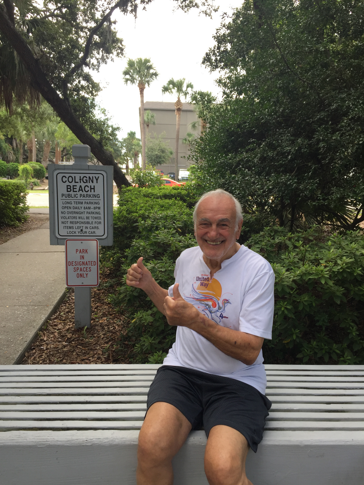 Tom Colasanto, of Savannah, Ga., sits on a bench Sunday, Aug. 12, 2018, near Coligny Beach on Hilton Head Island, S.C. Colasanto went into cardiac arrest on that same bench a year earlier, and tourists, strangers and first responders helped save his life.
