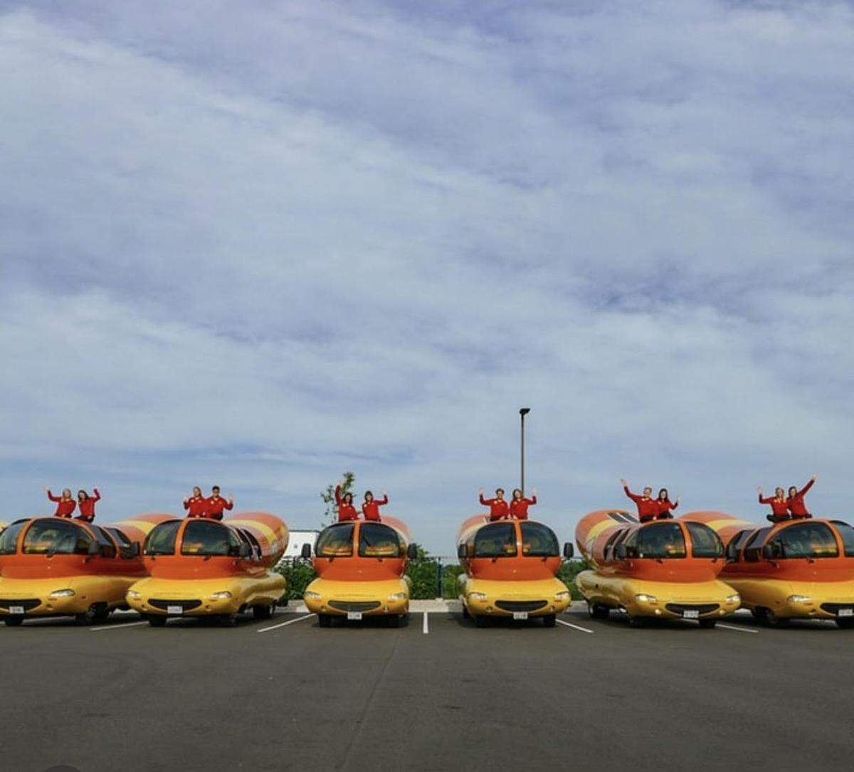 The six Oscar Mayer Wienermobiles.