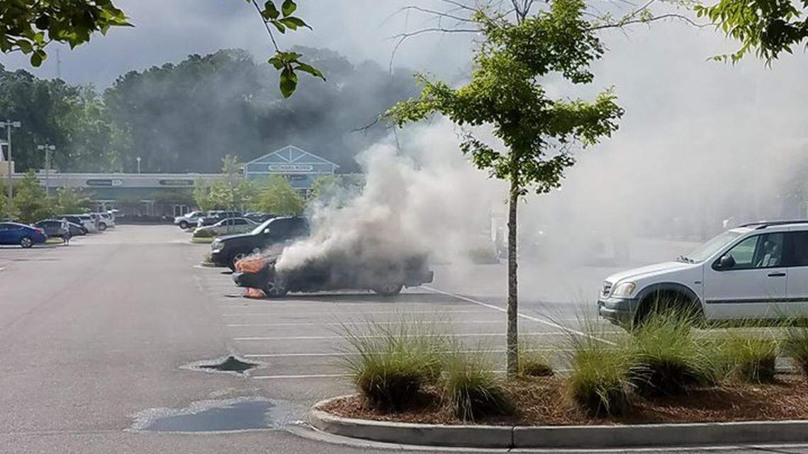 An older model Volvo caught fire in the Tanger Outlets 1 parking lot Thursday night.