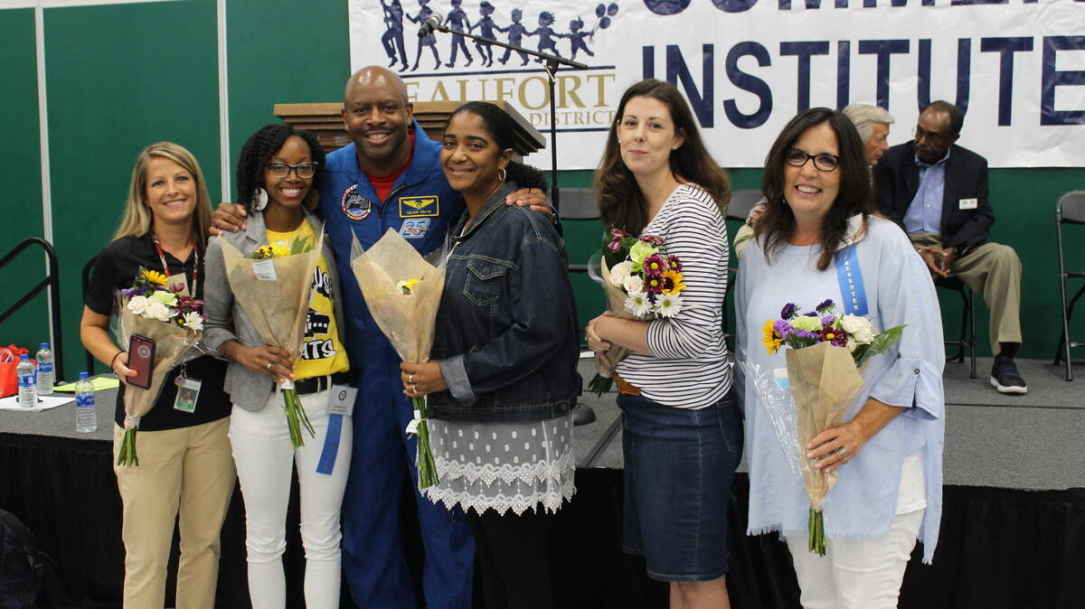 (From left to right) Brittany Carter, Tamekia Ford, Leland Melvin; Cora Lugo, Kelly Hall and Karen McKenzie.
