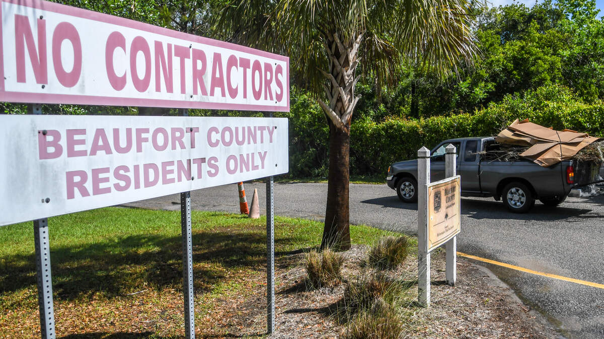 A truck pulls into the Beaufort County Convenience Center on Simmonsville Road on Monday, April 20, 2020, as a sign informs those entering that they must be Beaufort County residents to use the facility.