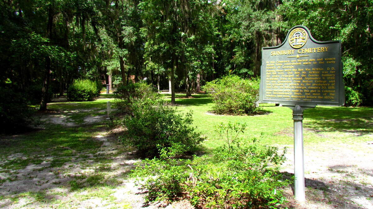 The old colonial graveyard, a garden of cracking stones and Spanish moss, is all that remains of the once-thriving port of Sunbury, Ga.