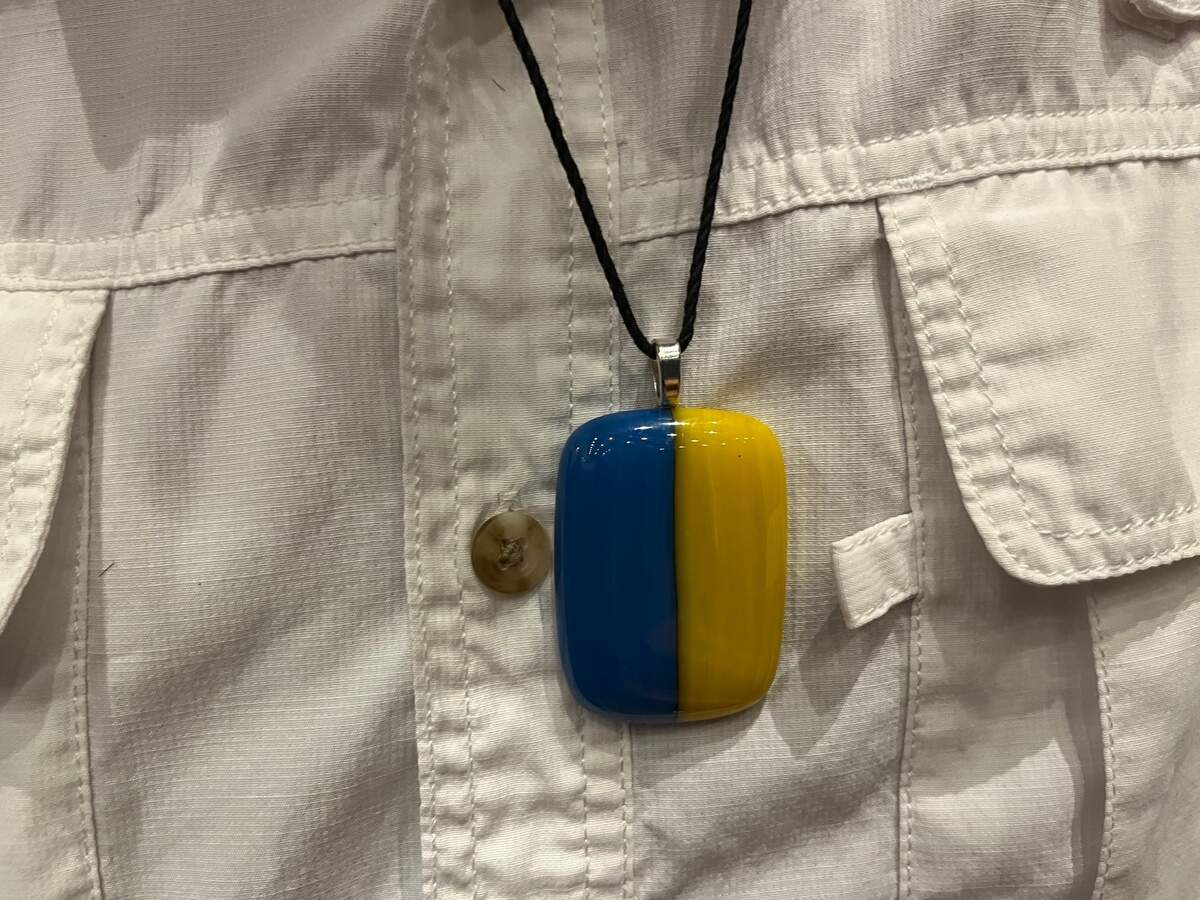 Greg Rawls has made pins and pendents of the Ukrainian flag that are selling like hotcakes.