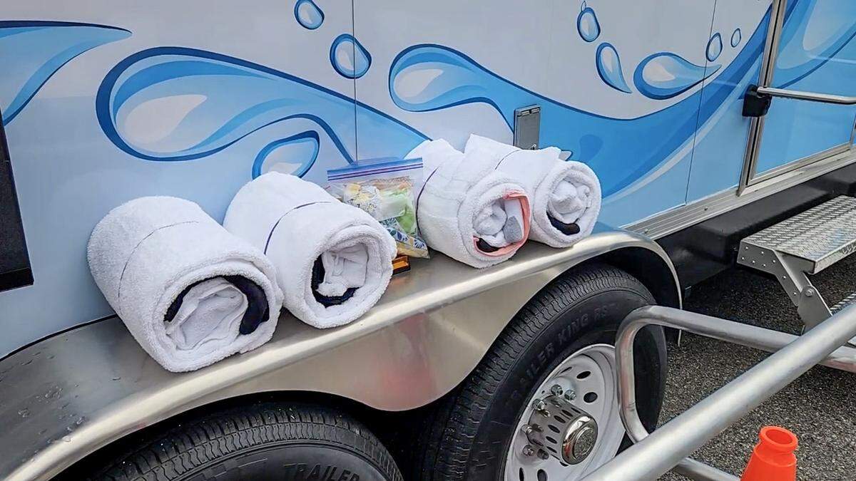 Each person will receive a shower roll that includes a bath mat, towel, wash cloth, shower shoes, a brush, deodorant and a toothbrush and toothpaste.