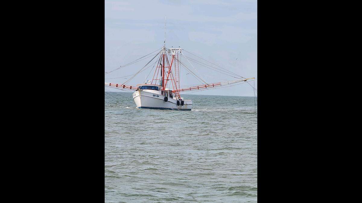 Sea Eagle Market’s Lydia Leigh near Pritchards Inlet, southwest of Fripp Island and between St. Helena and Port Royal sounds, on opening day of shrimp season Thursday.