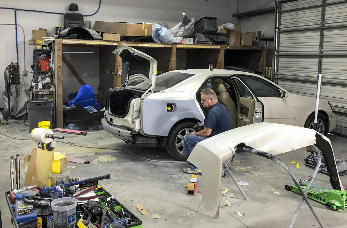 Workers at Bluffton Auto Body shop, replacing parts from cars involved in collisions. Joey Mucia Jr., owner, says his business’ ability to stay open during coronavirus hinges on the health his workers: “If one of them comes down with something, we’re done.”