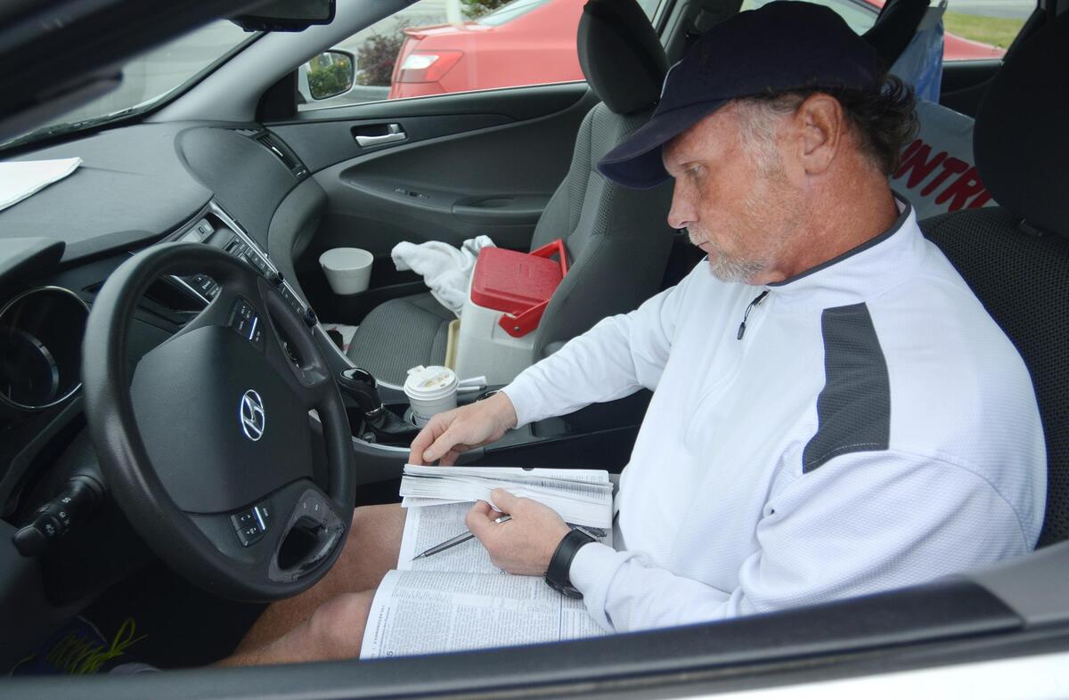 On the morning of Feb. 13, before he began his protest on the side of U.S. 278 at Hilton Head Hyundai, Greg Sanford Hackney drove over from Pt. Wentworth, Ga., where he spent the night, and stopped at a Hardeeville convenience store where he bought a coffee and sat in his car to study the Bible.