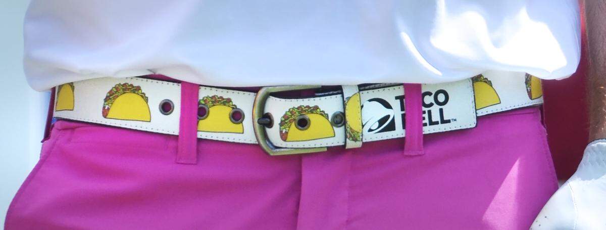 Defending champion Wesley Bryan waits to tee off on No. 9 during Friday's second round of the RBC Heritage Presented by Boeing golf tournament at Harbour Town Golf Links on Hilton Head Island. He is seen wearing a belt provided by one of his sponsors, Taco Bell.