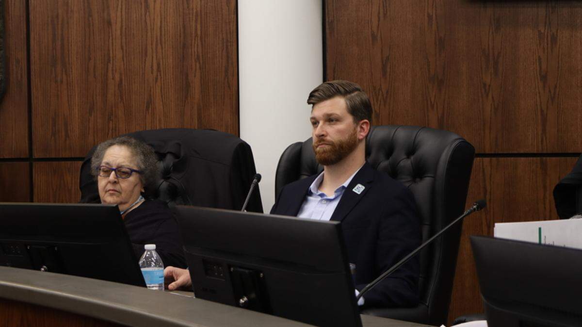 Beaufort County Councilman Logan Cunningham sits behind the lectern on Dec. 8, 2025. The councilman brought forward a “motion to rescind,” or otherwise overturn, a landslide vote made in September regarding the controversial Pine Island golf course development.