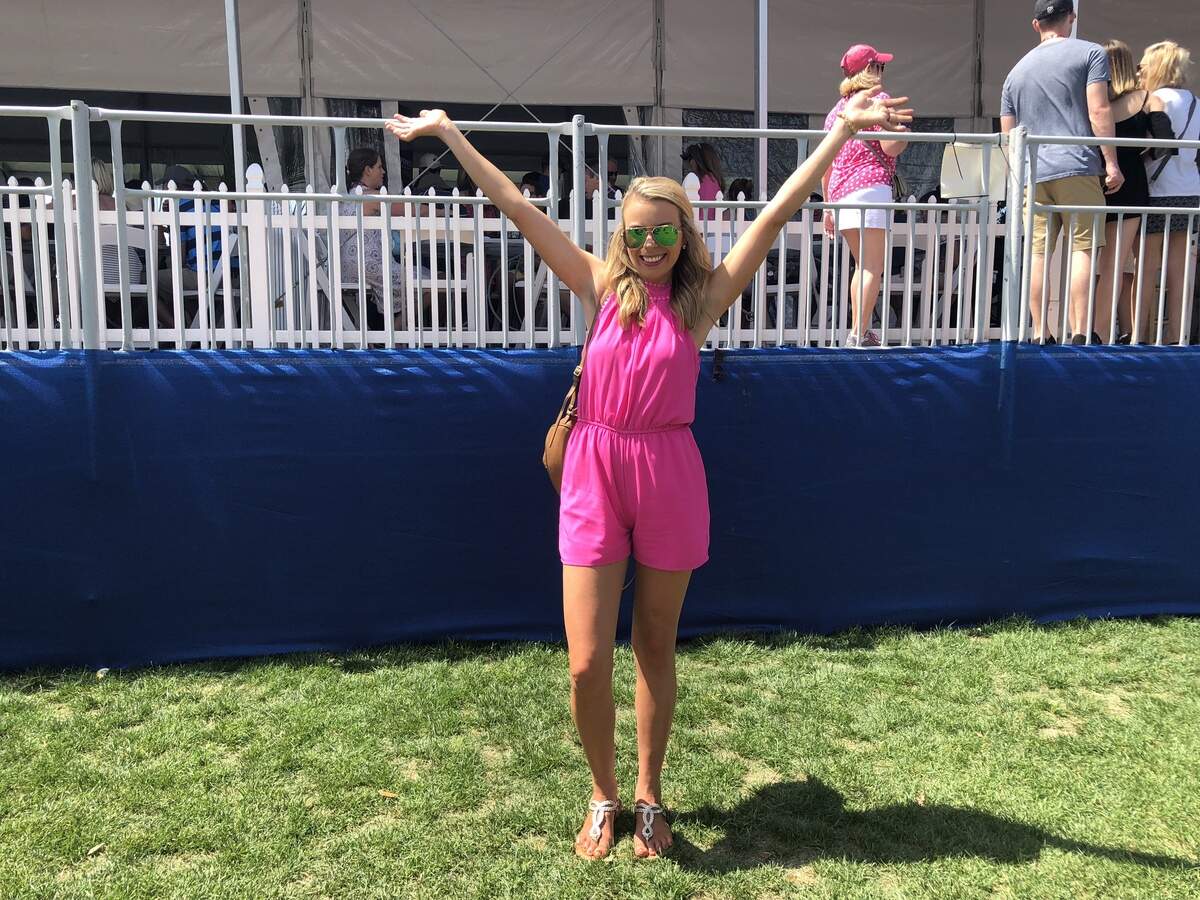 Alexis Grantham showed offer her neon pink romper, which set her apart in a sea of pastels.