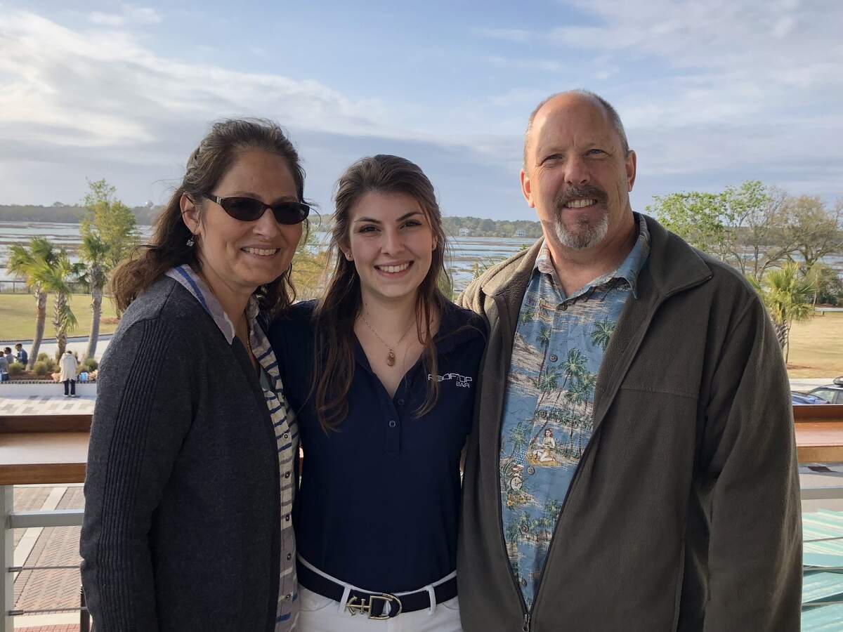 Serena Grumbine and her parents, Stephanie and Jim.