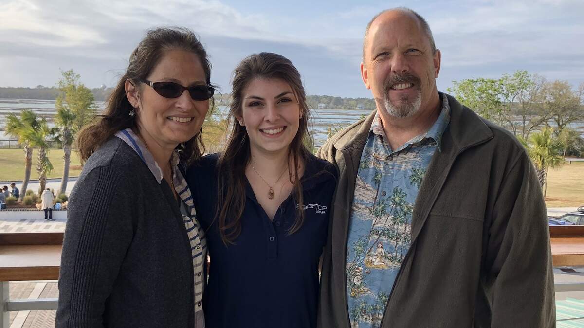 Serena Grumbine and her parents, Stephanie and Jim.