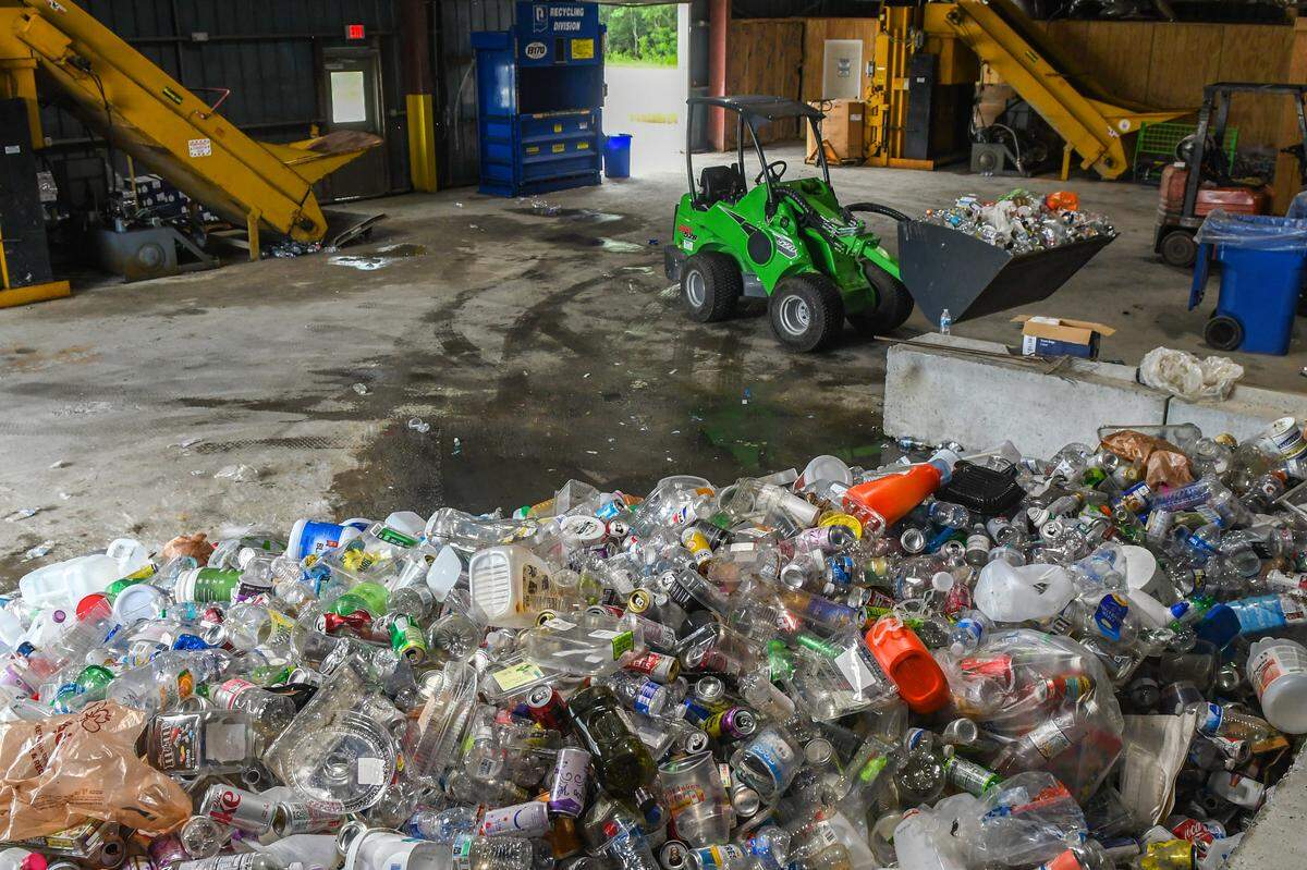 A pile of plastic, glass and aluminum waits to be sorted on July 12, 2024 at i2recycle’s facility located in the Hardeeville Industrial Park in Hardeeville, S.C.