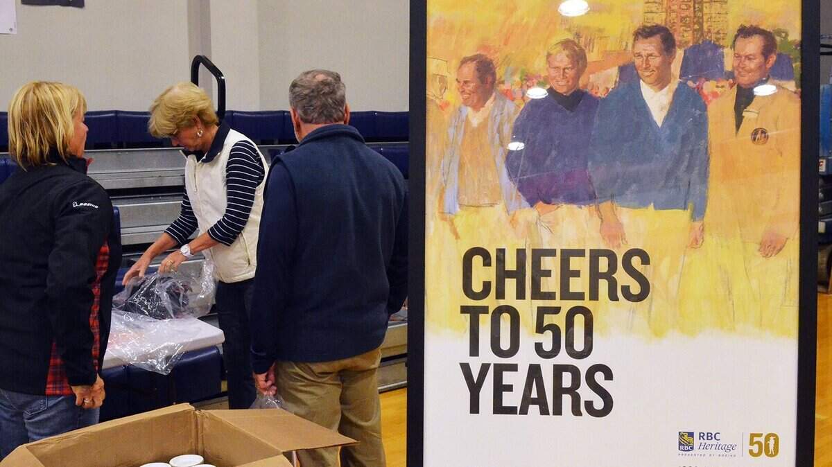 RBC Heritage Presented by Boeing 50th anniversary posters were on sale for $35 during the Heritage uniform distribution event held on Saturday, March 24, 2018 at the Hilton Head Preparatory School's Joseph B. Fraser Jr. Field House. The event -- an annual rite of spring for the golf tournament's massive volunteer corps -- is the day they come out to pick up clothing, credentials, parking passes and the tournament tickets they receive for volunteering. The 50th anniversary edition of the tournament begins with the opening ceremony and cannon blast on April 9. Tournament play begins on April 12 and the final round will be on Sunday, April 15.