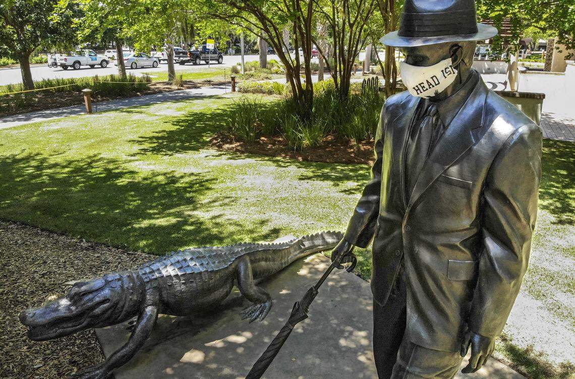 The Charles Fraser statue in Compass Rose Park on Hilton Head Island has now acquired a Hilton Head Island face mask as seen on Thursday, April 16, 2020 for personal protection against the coronavirus. While the individual that protected the founder of Hilton Head is unknown, it stopped the few walking or biking past the closed park to take a picture.