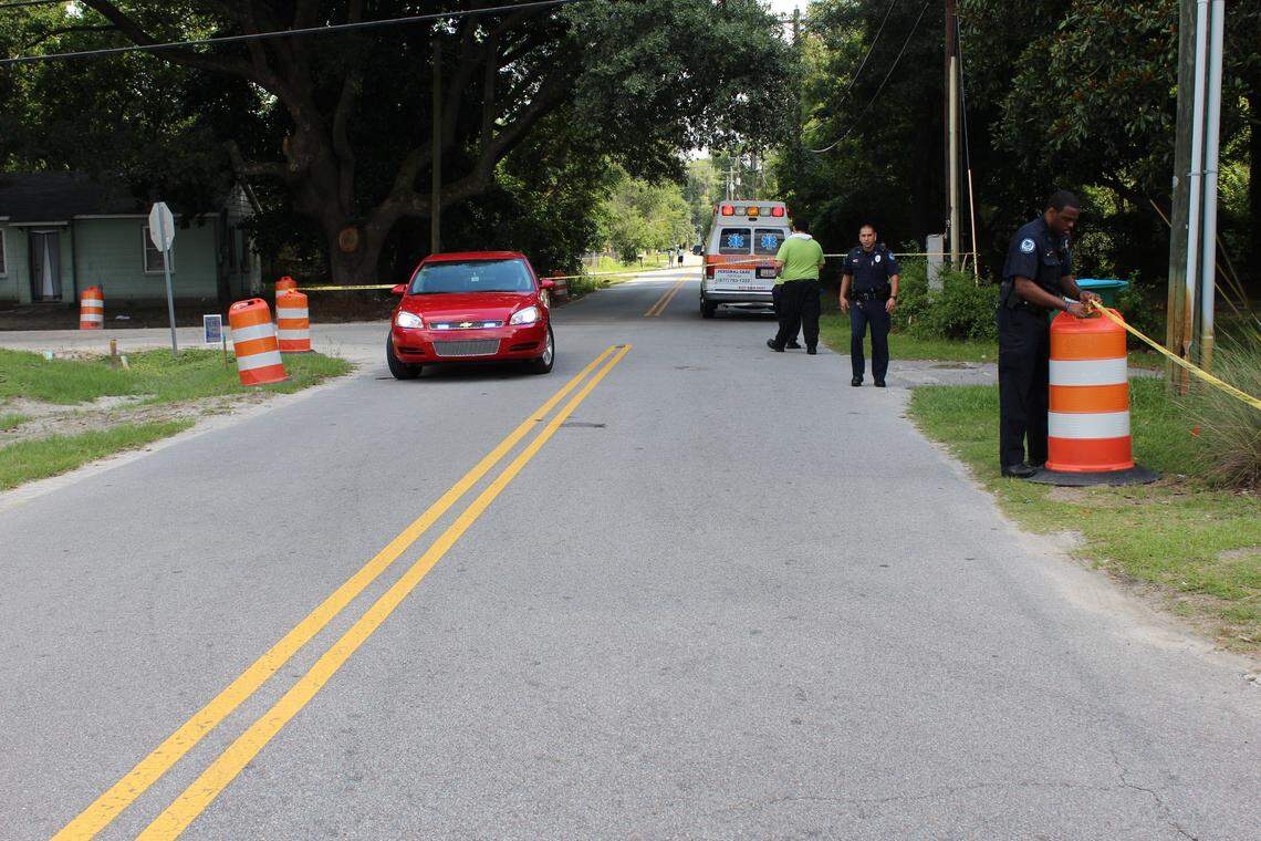 Investigators with the Beaufort Police Department collect evidence on Hogarth Street after a shooting outside a convenience store in Beaufort. John Dortch, who has a long history of petty crime and homelessness in Beaufort County, was shot in the neck by Isaiah Gadson Jr. Gadson was charged with attempted murder, which allowed law enforcement to retrieve a DNA sample with a buccal swab on the inside of his cheek.