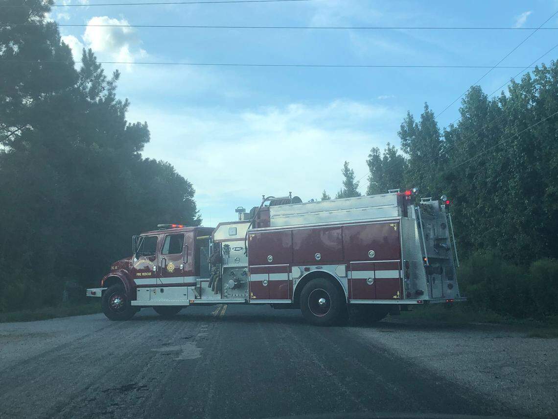 At the scene where Alex Murdaugh was shot, a firetruck from Hampton County Fire-Rescue blocks access to Salkehatchie Road on the early evening of Saturday, September 4, 2021.