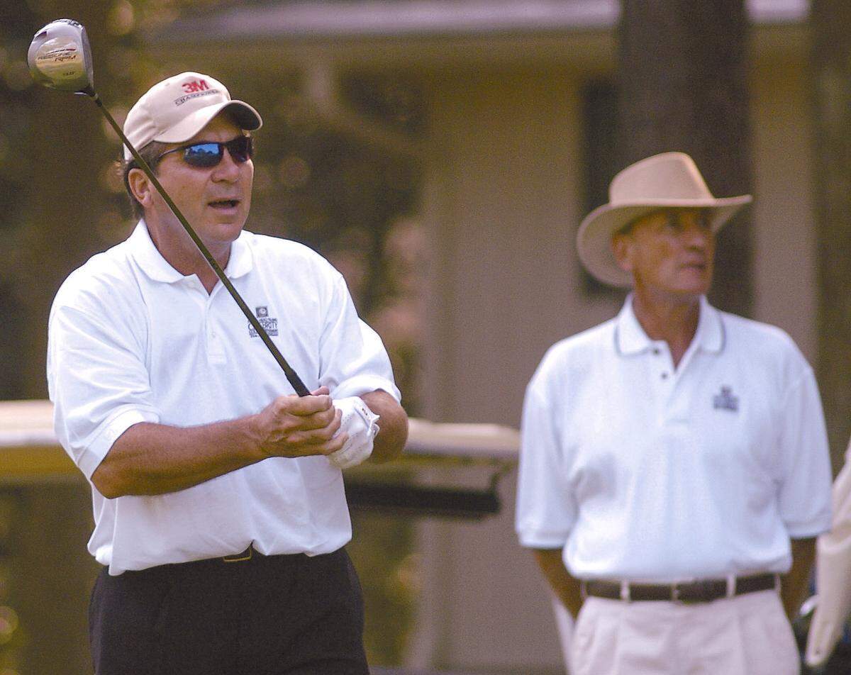 Johnny Bench watches his tee shot on the 15th hole of the Robert Trent Jones course at Palmetto Dunes during the Hilton Head Island Celebrity Golf Tournament on Sept.3, 2005.