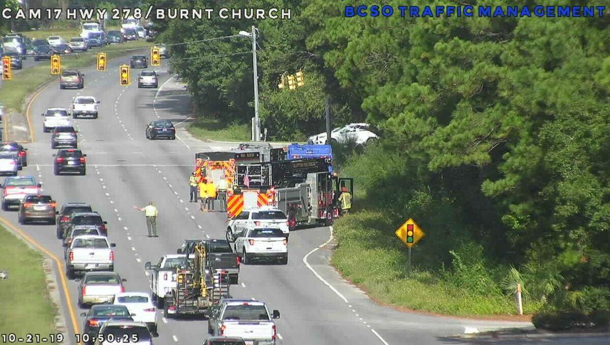 Two Bluffton fire engines fight smoke coming from a garbage truck on U.S. 278 and Burnt Church Road in Bluffton