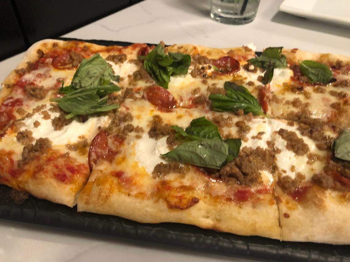 Mama G’s “The Boss” or Capo pizza is topped with tomato sauce, mozzarella, sausage, pepperoni, ricotta, basil and Asiago. 