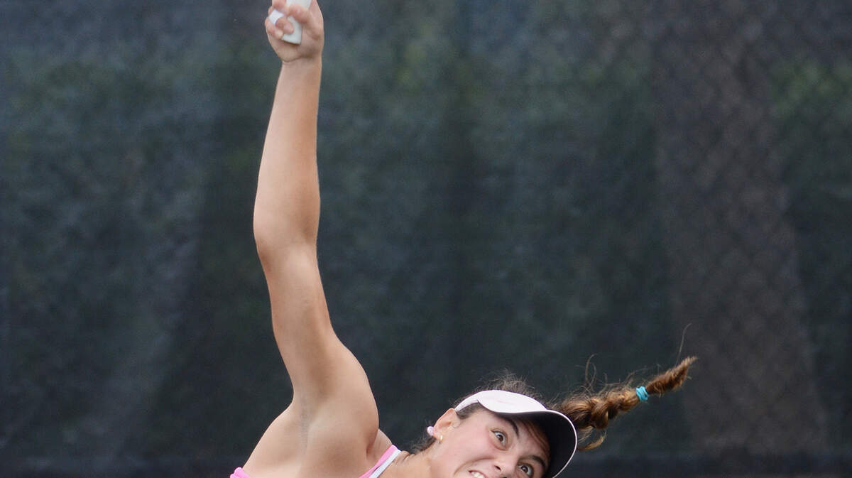 Alexa Graham serves to Ulrikki Eikeri during their Shipyard Cup singles final on Sunday.