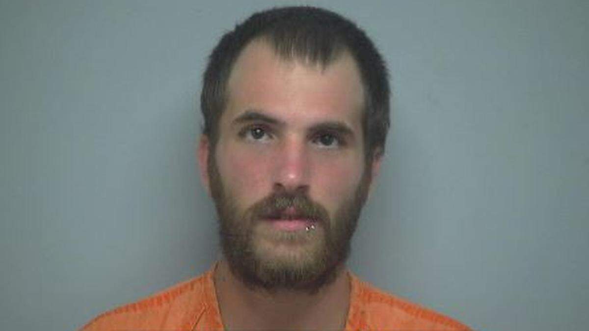 Nathaniel Kasper-Little, 24 of Burton, was arrested Wednesday and faces robbery charges in connection to two incidents at Port Royal gas stations.