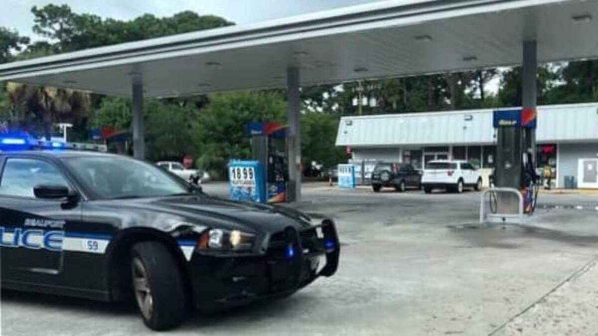 A Beaufort Police Department patrol car blocks an entrance to Sunoco gas station on Ribaut Road as officers served a search warrant Friday morning. The business was selling a synthetic urine product used to beat drug tests, a police news release said.