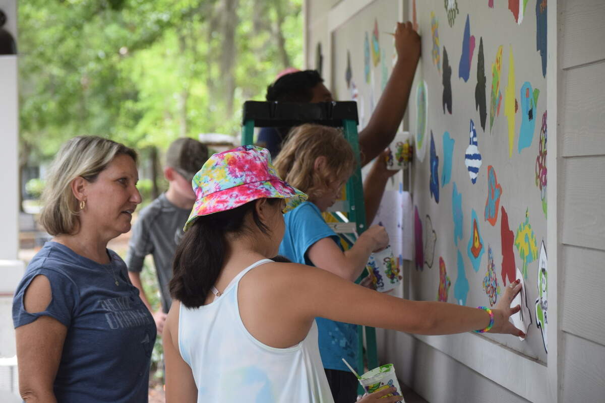 JoEllen Jacobs, art teacher at M.C. Riley Elementary School, led the mural painting in Bluffton’s Oscar Frazier Park on Saturday, June 5, 2021.