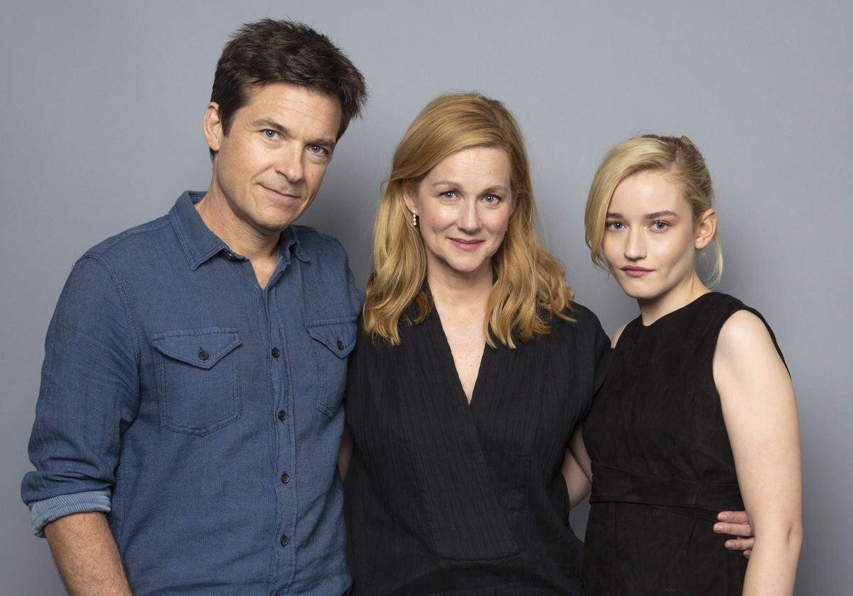 Jason Bateman, from left, Laura Linney and Julia Garner, cast members of the Netflix series “Ozark” pose for a photo during the Netflix portrait session at Television Critics Association Summer Press Tour at The Beverly Hilton hotel on Sunday, July 29, 2018, in Beverly Hills, Calif.