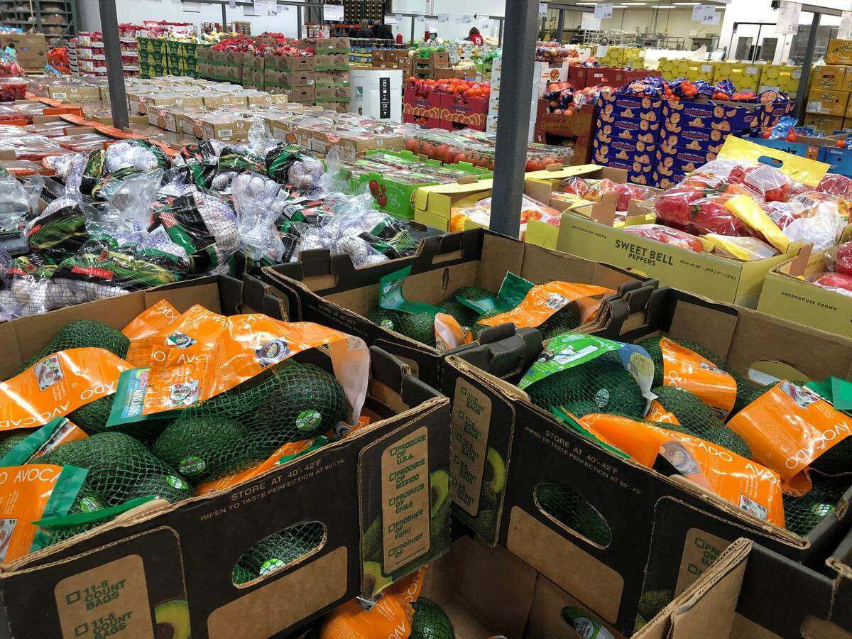 Boxes of produce are lined up for shoppers at the Costco warehouse in Charleston.